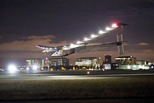 In this April 23, 2016 file photo, Solar Impulse 2 lands at Moffett Field in Mountain View, Calif., completing the leg of its journey from Hawaii in its attempt to circumnavigate the globe. A solar-powered airplane that landed in Oklahoma last week is headed to Ohio on the latest leg of its around-the-world journey. The Swiss-made Solar Impulse 2 took off from Tulsa International Airport about 5 a.m. Saturday, May 21, 2016, with a destination of Dayton, Ohio. The flight was expected to take about 18 hours.(AP Photo/Noah Berger